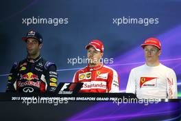 Daniil Kvyat (RUS), Red Bull Racing, Sebastian Vettel (GER), Scuderia Ferrari and Kimi Raikkonen (FIN), Scuderia Ferrari  19.09.2015. Formula 1 World Championship, Rd 13, Singapore Grand Prix, Singapore, Singapore, Qualifying Day.