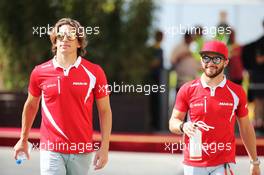 (L to R): Roberto Merhi (ESP) Manor Marussia F1 Team with team mate Will Stevens (GBR) Manor Marussia F1 Team. 27.11.2015. Formula 1 World Championship, Rd 19, Abu Dhabi Grand Prix, Yas Marina Circuit, Abu Dhabi, Practice Day.