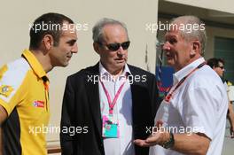 (L to R): Cyril Abiteboul (FRA) Renault Sport F1 Managing Director with Jerome Stoll (FRA) Renault Sport F1 President, and Dr Helmut Marko (AUT) Red Bull Motorsport Consultant.  27.11.2015. Formula 1 World Championship, Rd 19, Abu Dhabi Grand Prix, Yas Marina Circuit, Abu Dhabi, Practice Day.