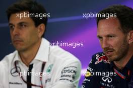 Christian Horner (GBR) Red Bull Racing Team Principal and Toto Wolff (GER) Mercedes AMG F1 Shareholder and Executive Director in the FIA Press Conference. 27.11.2015. Formula 1 World Championship, Rd 19, Abu Dhabi Grand Prix, Yas Marina Circuit, Abu Dhabi, Practice Day.