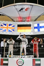 The podium (L to R): Lewis Hamilton (GBR) Mercedes AMG F1, second; Nico Rosberg (GER) Mercedes AMG F1, race winner; Kimi Raikkonen (FIN) Ferrari, third. 29.11.2015. Formula 1 World Championship, Rd 19, Abu Dhabi Grand Prix, Yas Marina Circuit, Abu Dhabi, Race Day.