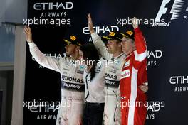 Lewis Hamilton (GBR), Mercedes AMG F1 Team and Nico Rosberg (GER), Mercedes AMG F1 Team  29.11.2015. Formula 1 World Championship, Rd 19, Abu Dhabi Grand Prix, Yas Marina Circuit, Abu Dhabi, Race Day.