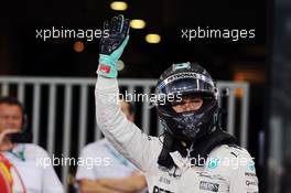 Nico Rosberg (GER) Mercedes AMG F1 celebrates his pole position in parc ferme. 28.11.2015. Formula 1 World Championship, Rd 19, Abu Dhabi Grand Prix, Yas Marina Circuit, Abu Dhabi, Qualifying Day.