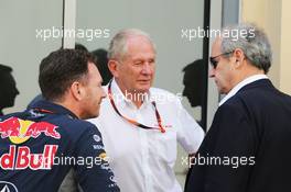 (L to R): Christian Horner (GBR) Red Bull Racing Team Principal with Dr Helmut Marko (AUT) Red Bull Motorsport Consultant and Jerome Stoll (FRA) Renault Sport F1 President. 28.11.2015. Formula 1 World Championship, Rd 19, Abu Dhabi Grand Prix, Yas Marina Circuit, Abu Dhabi, Qualifying Day.