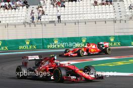 Kimi Raikkonen (FIN) Ferrari SF15-T leads team mate Sebastian Vettel (GER) Ferrari SF15-T. 28.11.2015. Formula 1 World Championship, Rd 19, Abu Dhabi Grand Prix, Yas Marina Circuit, Abu Dhabi, Qualifying Day.