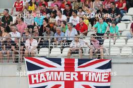 A union flag with Hammer Time written on it with the fans in the grandstand. 28.11.2015. Formula 1 World Championship, Rd 19, Abu Dhabi Grand Prix, Yas Marina Circuit, Abu Dhabi, Qualifying Day.