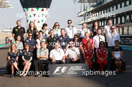 The Press Officers' end of season group photograph. 29.11.2015. Formula 1 World Championship, Rd 19, Abu Dhabi Grand Prix, Yas Marina Circuit, Abu Dhabi, Race Day.