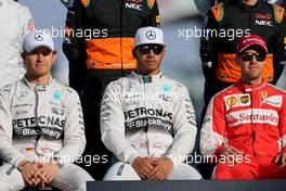 Nico Rosberg (GER), Mercedes AMG F1 Team, Lewis Hamilton (GBR), Mercedes AMG F1 Team and Sebastian Vettel (GER), Scuderia Ferrari  29.11.2015. Formula 1 World Championship, Rd 19, Abu Dhabi Grand Prix, Yas Marina Circuit, Abu Dhabi, Race Day.