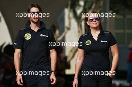 Romain Grosjean (FRA) Lotus F1 Team with Aurelie Donzelot (FRA) Lotus F1 Team Media Communications Manager. 26.11.2015. Formula 1 World Championship, Rd 19, Abu Dhabi Grand Prix, Yas Marina Circuit, Abu Dhabi, Preparation Day.