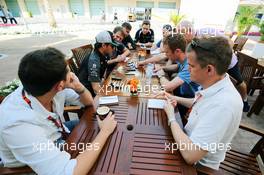 Sergio Perez (MEX) Sahara Force India F1 with the media. 26.11.2015. Formula 1 World Championship, Rd 19, Abu Dhabi Grand Prix, Yas Marina Circuit, Abu Dhabi, Preparation Day.