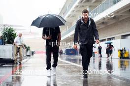 Lewis Hamilton (GBR) Mercedes AMG F1 in a wet and rainy paddock. 23.10.2015. Formula 1 World Championship, Rd 16, United States Grand Prix, Austin, Texas, USA, Practice Day.