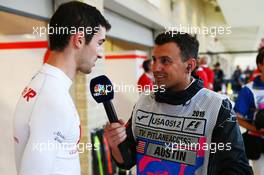 (L to R): Alexander Rossi (USA) Manor Marussia F1 Team with Will Buxton (GBR) NBC Sports Network TV Presenter. 23.10.2015. Formula 1 World Championship, Rd 16, United States Grand Prix, Austin, Texas, USA, Practice Day.