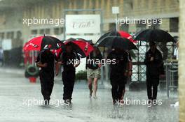 F1 umbrellas in the paddock in the rain. 23.10.2015. Formula 1 World Championship, Rd 16, United States Grand Prix, Austin, Texas, USA, Practice Day.
