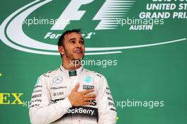 Race winner and World Champion Lewis Hamilton (GBR) Mercedes AMG F1 celebrates on the podium. 25.10.2015. Formula 1 World Championship, Rd 16, United States Grand Prix, Austin, Texas, USA, Race Day.