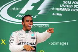 Race winner and World Champion Lewis Hamilton (GBR) Mercedes AMG F1 celebrates on the podium. 25.10.2015. Formula 1 World Championship, Rd 16, United States Grand Prix, Austin, Texas, USA, Race Day.