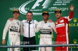 The podium (L to R): Nico Rosberg (GER) Mercedes AMG F1, second; Paddy Lowe (GBR) Mercedes AMG F1 Executive Director (Technical); Lewis Hamilton (GBR) Mercedes AMG F1, race winner and World Champion; Sebastian Vettel (GER) Ferrari, third. 25.10.2015. Formula 1 World Championship, Rd 16, United States Grand Prix, Austin, Texas, USA, Race Day.