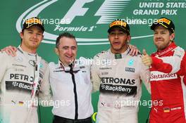 The podium (L to R): Nico Rosberg (GER) Mercedes AMG F1, second; Paddy Lowe (GBR) Mercedes AMG F1 Executive Director (Technical); Lewis Hamilton (GBR) Mercedes AMG F1, race winner and World Champion; Sebastian Vettel (GER) Ferrari, third. 25.10.2015. Formula 1 World Championship, Rd 16, United States Grand Prix, Austin, Texas, USA, Race Day.