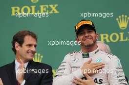 Race winner and World Champion Lewis Hamilton (GBR) Mercedes AMG F1 celebrates on the podium. 25.10.2015. Formula 1 World Championship, Rd 16, United States Grand Prix, Austin, Texas, USA, Race Day.