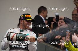 Race winner and World Champion Lewis Hamilton (GBR) Mercedes AMG F1 celebrates on the podium. 25.10.2015. Formula 1 World Championship, Rd 16, United States Grand Prix, Austin, Texas, USA, Race Day.