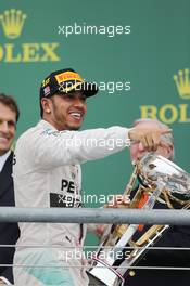 Race winner and World Champion Lewis Hamilton (GBR) Mercedes AMG F1 celebrates on the podium. 25.10.2015. Formula 1 World Championship, Rd 16, United States Grand Prix, Austin, Texas, USA, Race Day.
