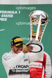 Race winner and World Champion Lewis Hamilton (GBR) Mercedes AMG F1 celebrates on the podium. 25.10.2015. Formula 1 World Championship, Rd 16, United States Grand Prix, Austin, Texas, USA, Race Day.