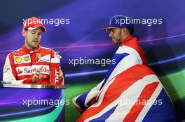 (L to R): Sebastian Vettel (GER) Ferrari and Lewis Hamilton (GBR) Mercedes AMG F1 in the FIA Press Conference. 25.10.2015. Formula 1 World Championship, Rd 16, United States Grand Prix, Austin, Texas, USA, Race Day.