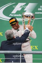 Race winner and World Champion Lewis Hamilton (GBR) Mercedes AMG F1 celebrates on the podium. 25.10.2015. Formula 1 World Championship, Rd 16, United States Grand Prix, Austin, Texas, USA, Race Day.