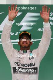 Race winner and World Champion Lewis Hamilton (GBR) Mercedes AMG F1 celebrates on the podium. 25.10.2015. Formula 1 World Championship, Rd 16, United States Grand Prix, Austin, Texas, USA, Race Day.