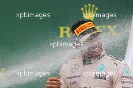 Race winner and World Champion Lewis Hamilton (GBR) Mercedes AMG F1 celebrates on the podium. 25.10.2015. Formula 1 World Championship, Rd 16, United States Grand Prix, Austin, Texas, USA, Race Day.