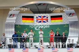 The podium (L to R): Nico Rosberg (GER) Mercedes AMG F1, second; Lewis Hamilton (GBR) Mercedes AMG F1, race winner and World Champion; Sebastian Vettel (GER) Ferrari, third. 25.10.2015. Formula 1 World Championship, Rd 16, United States Grand Prix, Austin, Texas, USA, Race Day.