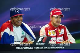 (L to R): Lewis Hamilton (GBR) Mercedes AMG F1 and Sebastian Vettel (GER) Ferrari in the FIA Press Conference. 25.10.2015. Formula 1 World Championship, Rd 16, United States Grand Prix, Austin, Texas, USA, Race Day.