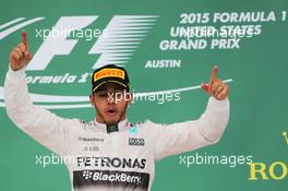 Race winner and World Champion Lewis Hamilton (GBR) Mercedes AMG F1 celebrates on the podium. 25.10.2015. Formula 1 World Championship, Rd 16, United States Grand Prix, Austin, Texas, USA, Race Day.