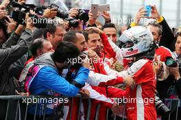 Sebastian Vettel (GER) Ferrari celebrates his third position in parc ferme. 25.10.2015. Formula 1 World Championship, Rd 16, United States Grand Prix, Austin, Texas, USA, Race Day.