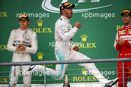 1st place and world champion Lewis Hamilton (GBR) Mercedes AMG F1, with 2nd place Nico Rosberg (GER) Mercedes AMG F1 W06 and 3rd place Sebastian Vettel (GER) Ferrari. 25.10.2015. Formula 1 World Championship, Rd 16, United States Grand Prix, Austin, Texas, USA, Race Day.