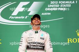 Race winner and World Champion Lewis Hamilton (GBR) Mercedes AMG F1 celebrates on the podium. 25.10.2015. Formula 1 World Championship, Rd 16, United States Grand Prix, Austin, Texas, USA, Race Day.