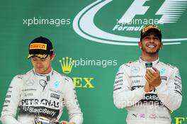 The podium (L to R): Nico Rosberg (GER) Mercedes AMG F1 with race winner and World Champion Lewis Hamilton (GBR) Mercedes AMG F1. 25.10.2015. Formula 1 World Championship, Rd 16, United States Grand Prix, Austin, Texas, USA, Race Day.