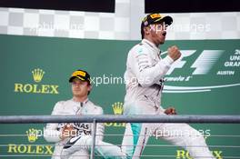 Race winner and World Champion Lewis Hamilton (GBR) Mercedes AMG F1 celebrates on the podium. 25.10.2015. Formula 1 World Championship, Rd 16, United States Grand Prix, Austin, Texas, USA, Race Day.