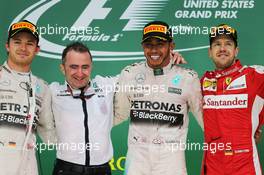 The podium (L to R): Nico Rosberg (GER) Mercedes AMG F1, second; Paddy Lowe (GBR) Mercedes AMG F1 Executive Director (Technical); Lewis Hamilton (GBR) Mercedes AMG F1, race winner and World Champion; Sebastian Vettel (GER) Ferrari, third. 25.10.2015. Formula 1 World Championship, Rd 16, United States Grand Prix, Austin, Texas, USA, Race Day.