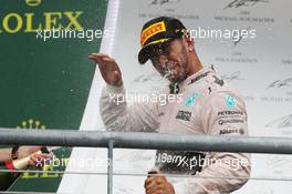 Race winner and World Champion Lewis Hamilton (GBR) Mercedes AMG F1 celebrates on the podium. 25.10.2015. Formula 1 World Championship, Rd 16, United States Grand Prix, Austin, Texas, USA, Race Day.