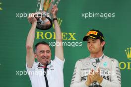 (L to R): Paddy Lowe (GBR) Mercedes AMG F1 Executive Director (Technical) celebrates on the podium with Nico Rosberg (GER) Mercedes AMG F1. 25.10.2015. Formula 1 World Championship, Rd 16, United States Grand Prix, Austin, Texas, USA, Race Day.