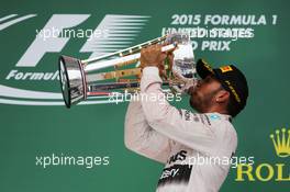 Race winner and World Champion Lewis Hamilton (GBR) Mercedes AMG F1 celebrates on the podium. 25.10.2015. Formula 1 World Championship, Rd 16, United States Grand Prix, Austin, Texas, USA, Race Day.