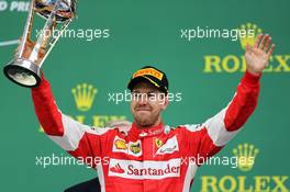 Sebastian Vettel (GER) Ferrari celebrates his third position on the podium. 25.10.2015. Formula 1 World Championship, Rd 16, United States Grand Prix, Austin, Texas, USA, Race Day.