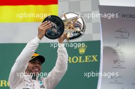 Race winner and World Champion Lewis Hamilton (GBR) Mercedes AMG F1 celebrates on the podium. 25.10.2015. Formula 1 World Championship, Rd 16, United States Grand Prix, Austin, Texas, USA, Race Day.