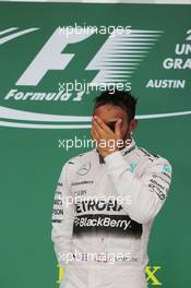 Race winner and World Champion Lewis Hamilton (GBR) Mercedes AMG F1 celebrates on the podium. 25.10.2015. Formula 1 World Championship, Rd 16, United States Grand Prix, Austin, Texas, USA, Race Day.