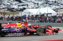 Daniil Kvyat (RUS) Red Bull Racing RB11 and Sebastian Vettel (GER) Ferrari SF15-T battle for position. 25.10.2015. Formula 1 World Championship, Rd 16, United States Grand Prix, Austin, Texas, USA, Race Day.