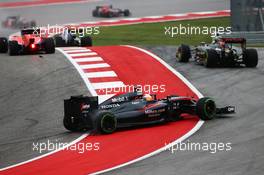 Fernando Alonso (ESP) McLaren MP4-30 recovers from a spin at the start of the race. 25.10.2015. Formula 1 World Championship, Rd 16, United States Grand Prix, Austin, Texas, USA, Race Day.