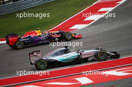 Lewis Hamilton (GBR) Mercedes AMG F1 W06 runs wide and is passed by Daniil Kvyat (RUS) Red Bull Racing RB11. 25.10.2015. Formula 1 World Championship, Rd 16, United States Grand Prix, Austin, Texas, USA, Race Day.