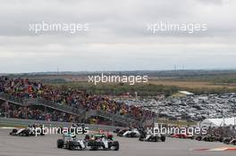 (L to R): Nico Rosberg (GER) Mercedes AMG F1 W06 and team mate Lewis Hamilton (GBR) Mercedes AMG F1 W06 battle for position at the start of the race. 25.10.2015. Formula 1 World Championship, Rd 16, United States Grand Prix, Austin, Texas, USA, Race Day.