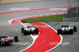 (L to R): Lewis Hamilton (GBR) Mercedes AMG F1 W06 and team mate Nico Rosberg (GER) Mercedes AMG F1 W06 battle for position at the start of the race. 25.10.2015. Formula 1 World Championship, Rd 16, United States Grand Prix, Austin, Texas, USA, Race Day.