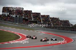 Will Stevens (GBR) Manor Marussia F1 Team leads Felipe Massa (BRA) Williams FW37  Alexander Rossi (USA) Manor Marussia F1 Team and Romain Grosjean (FRA) Lotus F1 E23. 25.10.2015. Formula 1 World Championship, Rd 16, United States Grand Prix, Austin, Texas, USA, Race Day.